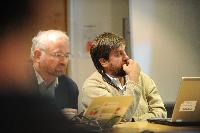 Photographs of people at an unknown event at the e-Science Centre, 3rd November 2009. Professor Austin Tate, Dr Stephen Potter and Dr Visalakshmi Suresh are amongst the people present.