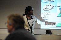 Photographs of people at an unknown event at the e-Science Centre, 3rd November 2009. Professor Austin Tate, Dr Stephen Potter and Dr Visalakshmi Suresh are amongst the people present.