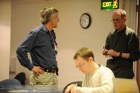 Photographs of people at an unknown event at the e-Science Centre, 3rd November 2009. Professor Austin Tate, Dr Stephen Potter and Dr Visalakshmi Suresh are amongst the people present.