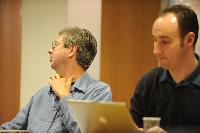 Photographs of people at an unknown event at the e-Science Centre, 3rd November 2009. Professor Austin Tate, Dr Stephen Potter and Dr Visalakshmi Suresh are amongst the people present.