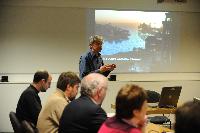 Photographs of people at an unknown event at the e-Science Centre, 3rd November 2009. Professor Austin Tate, Dr Stephen Potter and Dr Visalakshmi Suresh are amongst the people present.