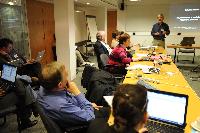 Photographs of people at an unknown event at the e-Science Centre, 3rd November 2009. Professor Austin Tate, Dr Stephen Potter and Dr Visalakshmi Suresh are amongst the people present.
