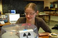Photographs of Jennifer Owen and Christine Straight performing an unknown experiment during their 3rd Year Physics Laboratories.