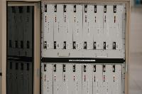 Photographs of the QCDOC supercomputer.