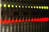 Photographs of the QCDOC supercomputer.