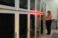 Photographs of the QCDOC supercomputer.