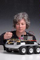 A set of photographs of Professor Barbara Webb of the University of Edinburgh School of Informatics.  Pictured with electronic circuitry and components.