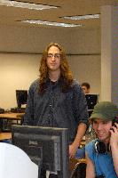 A set of photographs of a man named James Addison, pictured with computers.  Images taken for the Science and Engineering publication in March 2007.
