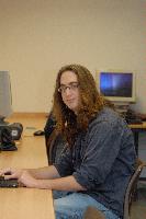 A set of photographs of a man named James Addison, pictured with computers.  Images taken for the Science and Engineering publication in March 2007.