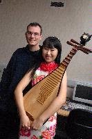EPCC held a sherry reception for the 2005/06 graduates of the MSc in High Performance Computing on the 28th November 2006. One of the graduates Zhaoyang Dong gave a recital on the pipa (Chinese lute). The graduands of 05/06 were Lee-Shawn Chin, Martin Chorley, Brian Dobbins, Zhaoyang Dong, Xu Guo, Heike Jagode, Heather Kelly, George Kyriacou, Xiaochi Ma, Erik McClements, Geraldine McKenna, Dmitri Mehhovits, Derek Murray, Radoslaw Ostrowski, Aristides Papadopoulos, Parag Patel, Michal Piotrowski, Howard Price, Steven Rose, Christos Soulios and Yuan Wan.