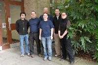 An image of EPCC staff wearing t-shirts in order to promote the OGSA DAI computing system.