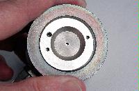 Image of an unknown metal device created in the Physics workshop.