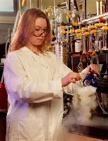 A set of images of unknown students performing chemistry experiments.
