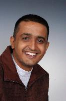 Photographs of unknown MSc in HPC students, EPCC and photographs of Physics Post Grads with some eScience MScs. 2005.