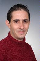 Photographs of unknown MSc in HPC students, EPCC and photographs of Physics Post Grads with some eScience MScs. 2005.