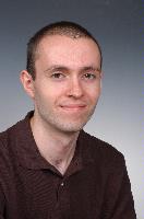 Photographs of unknown MSc in HPC students, EPCC and photographs of Physics Post Grads with some eScience MScs. 2005.