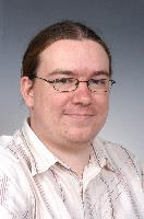 Photographs of unknown MSc in HPC students, EPCC and photographs of Physics Post Grads with some eScience MScs. 2005.