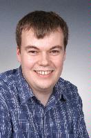 Photographs of unknown MSc in HPC students, EPCC and photographs of Physics Post Grads with some eScience MScs. 2005.