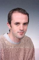 Photographs of unknown MSc in HPC students, EPCC and photographs of Physics Post Grads with some eScience MScs. 2005.