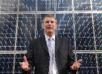 Photographs of Mr Nichol Stephen MSP visiting the King's Buildings on February, 2007. Photographs taken in front of the solar panels on the facade of the William Rankine Building and inside an unknown workshop.