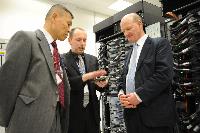 Joint HECToR Phase 3 (Cray) and Blue Gene/Q (IBM) launch, Feb 2012: George Chiu IBM; Dr Peter Boyle; David Willetts, Minister for Universities and Science; Lily Johnson (won comp to design HECToR doors graphic); Prof Arthur Trew, Prof Nigel Brown (Vice-Principal Planning, Resources and Research Policy), Prof Richard Kenway; Professor Sir Timothy O'Shea (Principal); Fiona Burgess (Cray); Ulla Thiel (Cray Vice President for Europe, the Middle East and Africa); Dr Mark Parsons (EPCC Joint Director); David Delpy (EPSRC Chief Executive);