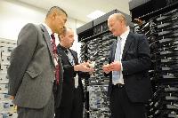 Joint HECToR Phase 3 (Cray) and Blue Gene/Q (IBM) launch, Feb 2012: George Chiu IBM; Dr Peter Boyle; David Willetts, Minister for Universities and Science; Lily Johnson (won comp to design HECToR doors graphic); Prof Arthur Trew, Prof Nigel Brown (Vice-Principal Planning, Resources and Research Policy), Prof Richard Kenway; Professor Sir Timothy O'Shea (Principal); Fiona Burgess (Cray); Ulla Thiel (Cray Vice President for Europe, the Middle East and Africa); Dr Mark Parsons (EPCC Joint Director); David Delpy (EPSRC Chief Executive);