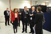 Joint HECToR Phase 3 (Cray) and Blue Gene/Q (IBM) launch, Feb 2012: George Chiu IBM; Dr Peter Boyle; David Willetts, Minister for Universities and Science; Lily Johnson (won comp to design HECToR doors graphic); Prof Arthur Trew, Prof Nigel Brown (Vice-Principal Planning, Resources and Research Policy), Prof Richard Kenway; Professor Sir Timothy O'Shea (Principal); Fiona Burgess (Cray); Ulla Thiel (Cray Vice President for Europe, the Middle East and Africa); Dr Mark Parsons (EPCC Joint Director); David Delpy (EPSRC Chief Executive);