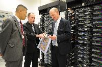 Joint HECToR Phase 3 (Cray) and Blue Gene/Q (IBM) launch, Feb 2012: George Chiu IBM; Dr Peter Boyle; David Willetts, Minister for Universities and Science; Lily Johnson (won comp to design HECToR doors graphic); Prof Arthur Trew, Prof Nigel Brown (Vice-Principal Planning, Resources and Research Policy), Prof Richard Kenway; Professor Sir Timothy O'Shea (Principal); Fiona Burgess (Cray); Ulla Thiel (Cray Vice President for Europe, the Middle East and Africa); Dr Mark Parsons (EPCC Joint Director); David Delpy (EPSRC Chief Executive);