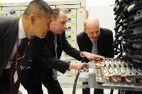 Joint HECToR Phase 3 (Cray) and Blue Gene/Q (IBM) launch, Feb 2012: George Chiu IBM; Dr Peter Boyle; David Willetts, Minister for Universities and Science; Lily Johnson (won comp to design HECToR doors graphic); Prof Arthur Trew, Prof Nigel Brown (Vice-Principal Planning, Resources and Research Policy), Prof Richard Kenway; Professor Sir Timothy O'Shea (Principal); Fiona Burgess (Cray); Ulla Thiel (Cray Vice President for Europe, the Middle East and Africa); Dr Mark Parsons (EPCC Joint Director); David Delpy (EPSRC Chief Executive);