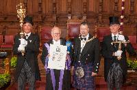 Professor Peter Higgs and the Lord Provost of the City of Edinburgh, the Rt Hon Donald Wilson accompanied by the Cermonial Mace and Sword of trhe University; Edinburgh Graduation 2014