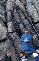 Photographs of geoscience students on an expedition, or field trip, to a rocky beach.  10 images.