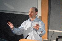 Photographs of Robert Grossman, the Managing Partner of Open Data Group, talking at the UK e-Science All Hands Meeting, September 2008, in a lecture theatre in Appleton Tower.