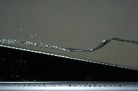 A set of pictures from a fluid dynamics experiment that was carried out in a small water tank in February 2007.  32 items.