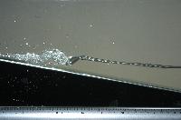 A set of pictures from a fluid dynamics experiment that was carried out in a small water tank in February 2007.  32 items.