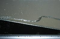 A set of pictures from a fluid dynamics experiment that was carried out in a small water tank in February 2007.  32 items.