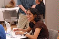 Photographs of unknown people at the UK e-Science All Hands Meeting, September 2008. Locations include the Appleton Tower foyer and lecture theatres as well a several locations within the Dugald Stewart Building at the University of Edinburgh.