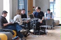 Photographs of unknown people at the UK e-Science All Hands Meeting, September 2008. Locations include the Appleton Tower foyer and lecture theatres as well a several locations within the Dugald Stewart Building at the University of Edinburgh.