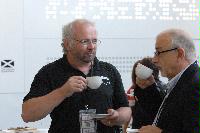 Photographs of unknown people at the UK e-Science All Hands Meeting, September 2008. Locations include the Appleton Tower foyer and lecture theatres as well a several locations within the Dugald Stewart Building at the University of Edinburgh.
