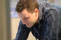 Photographs of unknown people at the UK e-Science All Hands Meeting, September 2008. Locations include the Appleton Tower foyer and lecture theatres as well a several locations within the Dugald Stewart Building at the University of Edinburgh.