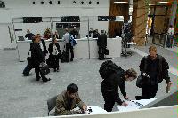 People registering at the reception for the UK e-Science All Hands Meeting, September 2008, in the foyer of the Dugald Stewart Building at the University of Edinburgh, on Charles Street.