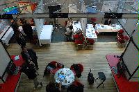 Photographs of stands at the UK e-Science All Hands Meeting, September 2008, in Appleton Tower, George Square. In the photographs four known people are present: Mr Gilbert Mensah, Dr Phil Trinder, Dr Mario Antonioletti and Dr Tim Parkinson. The rest are unknown.
