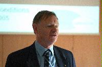 Photographs of Regius Professor Peter Grant and Dr John Jeffrey talking at the UoE open day on Fire Safety Engineering, in the Erskine Williamson Building, King's Buildings. Photographs taken on the 1st of November 2005.