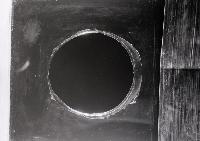 Bolt lightning struck a window. The result on the glass is photographed by Peter Tuffy.