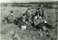 Physics Society Album 2. Photographer unknown. Copyright unknown. Album cover - knight and horse. Dates vary: 1941, 1942, 1943, 1944, 1947, 1948, 1949. Events included are Balerno to Flotterstone 1941, Meal Monday 1942, Meal Monday 1944, Soutra via Lammermoors and Humbie 1944, Balerno to Carlops 1944, Balerno to Carlops 1945, Meal Monday 1947, Edgelaw Reservoir Picnic 1947, Dramatic Night "The Dover Road" 1948, Peebles Meal Monday 1949, Play: "While The Sun Shines" 1949, Spring Hike Gladhouse to Peebles 1949, Charities Day and the Physics Society Picnic Pittencrieff Dunfermline. Photographed are the Standing Committees of 1942-43, 1943-44, 1944-45, 1947-48. Photographs include Bill Cochrane and Robert Schlapp.