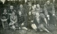 Physics Society Album 2. Photographer unknown. Copyright unknown. Album cover - knight and horse. Dates vary: 1941, 1942, 1943, 1944, 1947, 1948, 1949. Events included are Balerno to Flotterstone 1941, Meal Monday 1942, Meal Monday 1944, Soutra via Lammermoors and Humbie 1944, Balerno to Carlops 1944, Balerno to Carlops 1945, Meal Monday 1947, Edgelaw Reservoir Picnic 1947, Dramatic Night "The Dover Road" 1948, Peebles Meal Monday 1949, Play: "While The Sun Shines" 1949, Spring Hike Gladhouse to Peebles 1949, Charities Day and the Physics Society Picnic Pittencrieff Dunfermline. Photographed are the Standing Committees of 1942-43, 1943-44, 1944-45, 1947-48. Photographs include Bill Cochrane and Robert Schlapp.