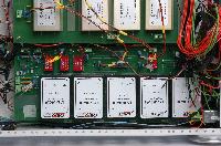 Photograph of the electronic circuitry of a lens power supply, created in a university workshop.  6 images.