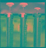 Photograph of variable volume pipettes.