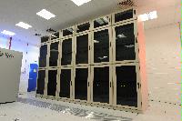 A set of images of the QCDOC supercomputer.  This is a computer used solely for calculations related to Quantum Chromodynamics.  It is owned by a collaboration of UK lattice physicists UKQCD, Columbia University, Brookhaven National Laboratory and IBM.  16 images.