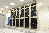 A set of images of the QCDOC supercomputer.  This is a computer used solely for calculations related to Quantum Chromodynamics.  It is owned by a collaboration of UK lattice physicists UKQCD, Columbia University, Brookhaven National Laboratory and IBM.  16 images.