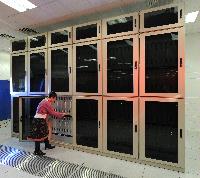 A set of images of the QCDOC supercomputer.  This is a computer used solely for calculations related to Quantum Chromodynamics.  It is owned by a collaboration of UK lattice physicists UKQCD, Columbia University, Brookhaven National Laboratory and IBM.  16 images.